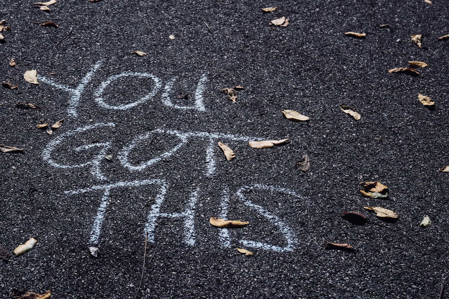 Chalk words "you got this"