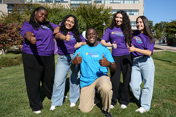 Raptor Rep students posing for a photo on campus