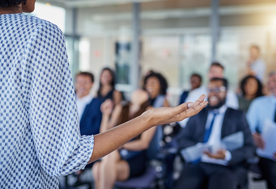 a instructor led training session with professional in business casual attire